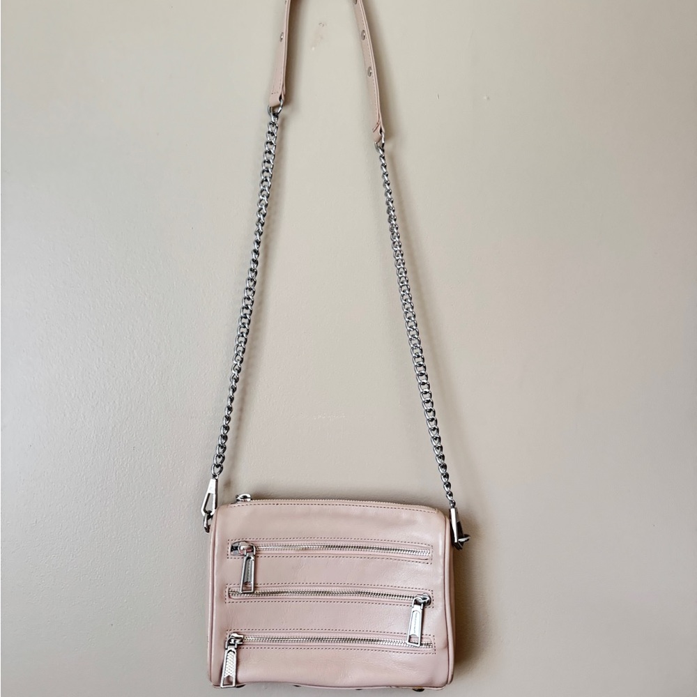 Rebecca Minkoff light Pink multi-zipper cross-body bag.
